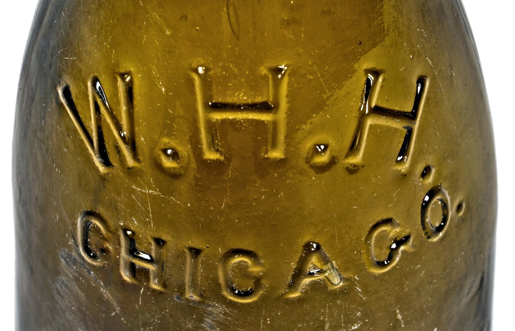 very rare and completely intact chicago privy dug c. 1865-7 deep olive green champagne shaped quart size bottle manufactured for chicago bottler william henry hutchinson.