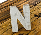 one of several matching mid-20th century american industrial cast aluminum michael reese hospital exterior single-sided building facade letter sign with nicely aged patina