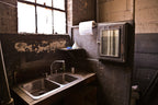 original c. 1920's antique american industrial refinished cast iron durable "palmer no waste" roberts electric company machine shop lavatory toilet paper holder