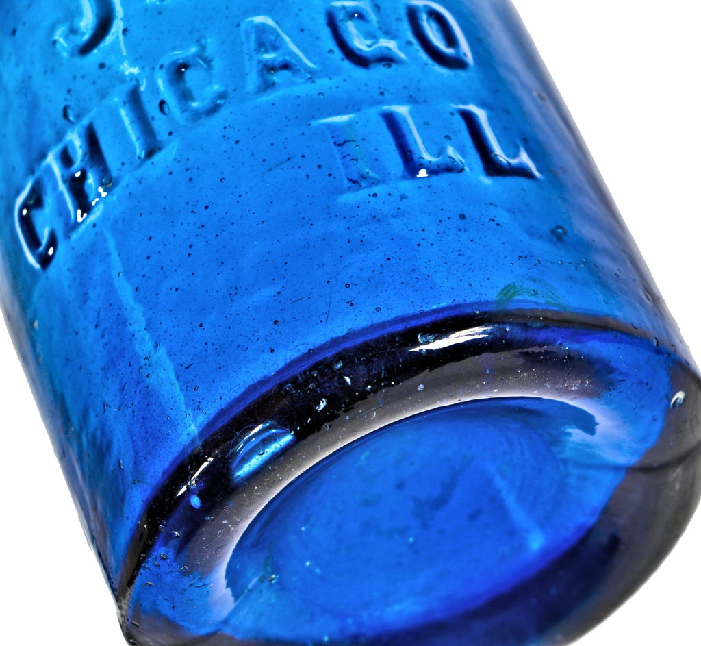 exceptional hard to find pre-civil war era richly colored cobalt blue glass iron-pontiled soda bottle fabricated for chicago bottler john lomax