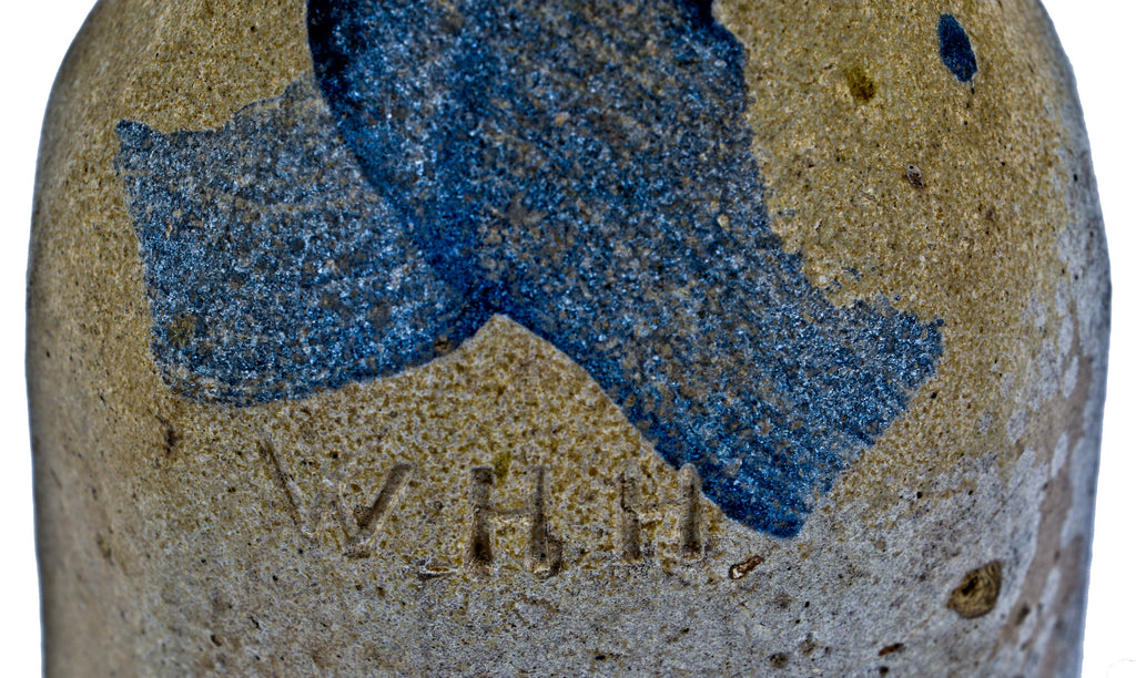 hard to find original 1850's glazed beer or cider stoneware bottle with cobalt blue "x" fabricated for chicago bottler william henry hutchinson.