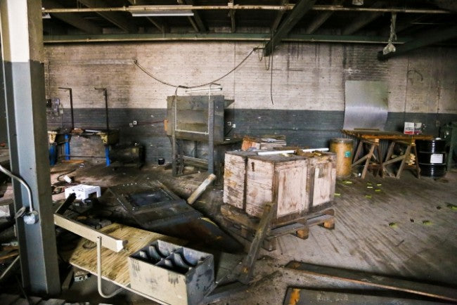 one of three pairs of original mid-20th century vintage american industrial lyon pressed and folded channeled steel green enameled legs or bases with flared feet