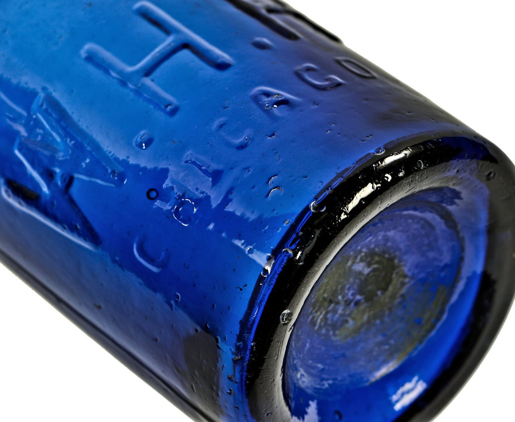 all original mint condition 1850's dark electric blue "w.h.h." iron pontiled soda bottle manufactured for chicago bottler william henry hutchinson