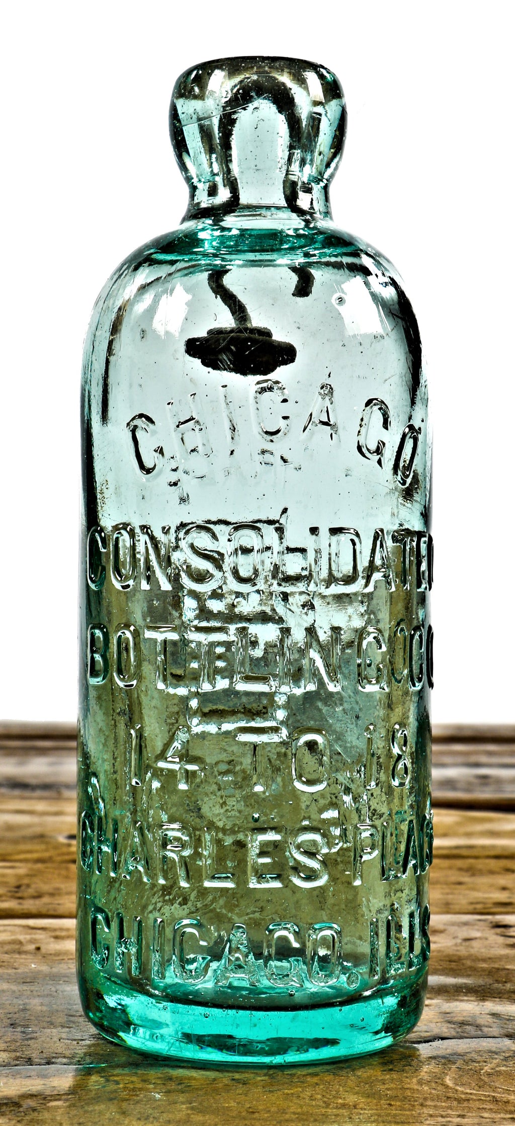 original and completely intact c. 1880's attic mint light aqua hutchinson style blobtop soda bottle manufactured for the consolidated bottling co., in chicago, il.