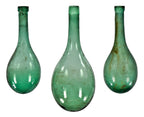 lot of three nearly identical mid-nineteenth century hand blown chianti rounded wine flasks salvaged from the former howard johnson inn.