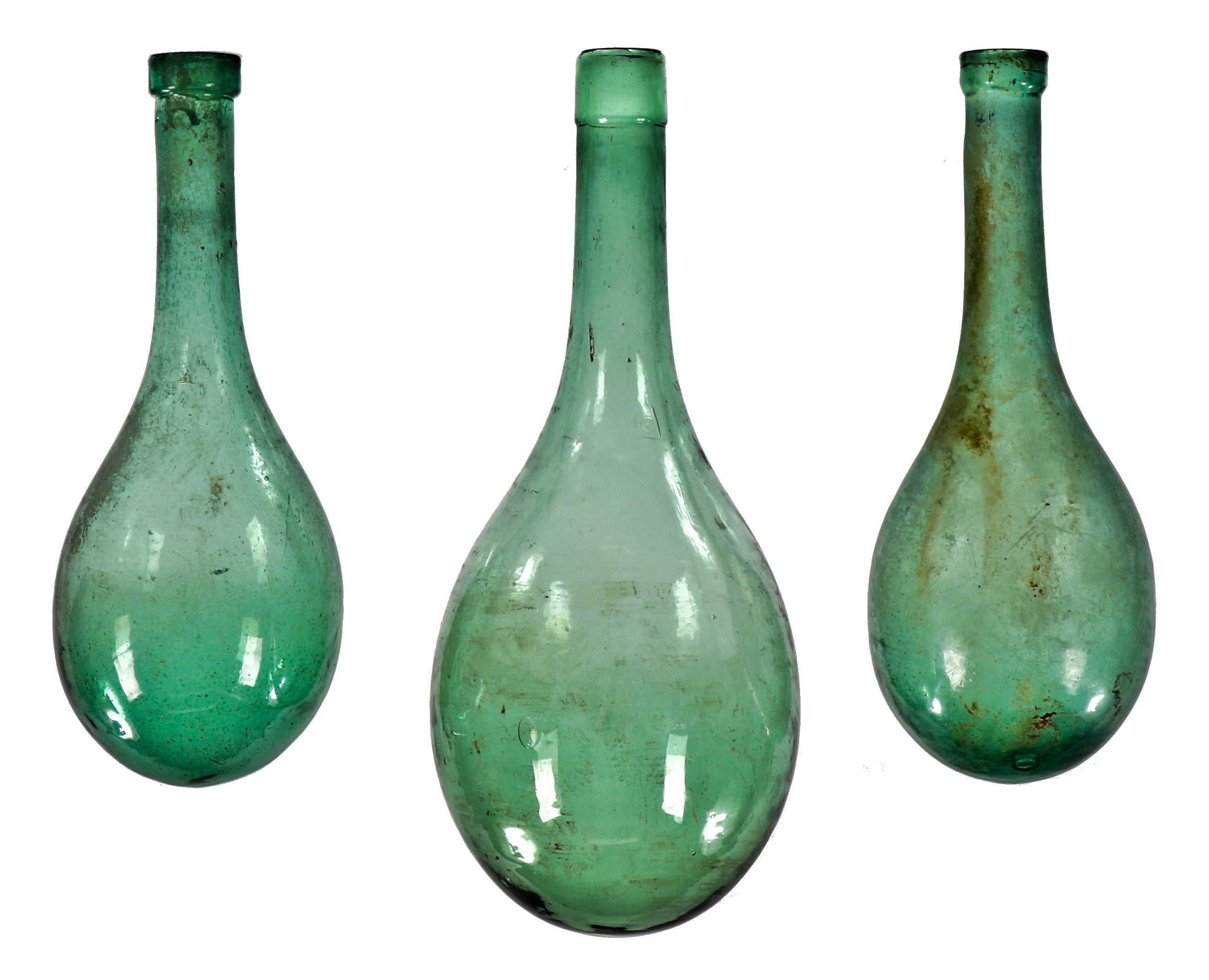 lot of three nearly identical mid-nineteenth century hand blown chianti rounded wine flasks salvaged from the former howard johnson inn.
