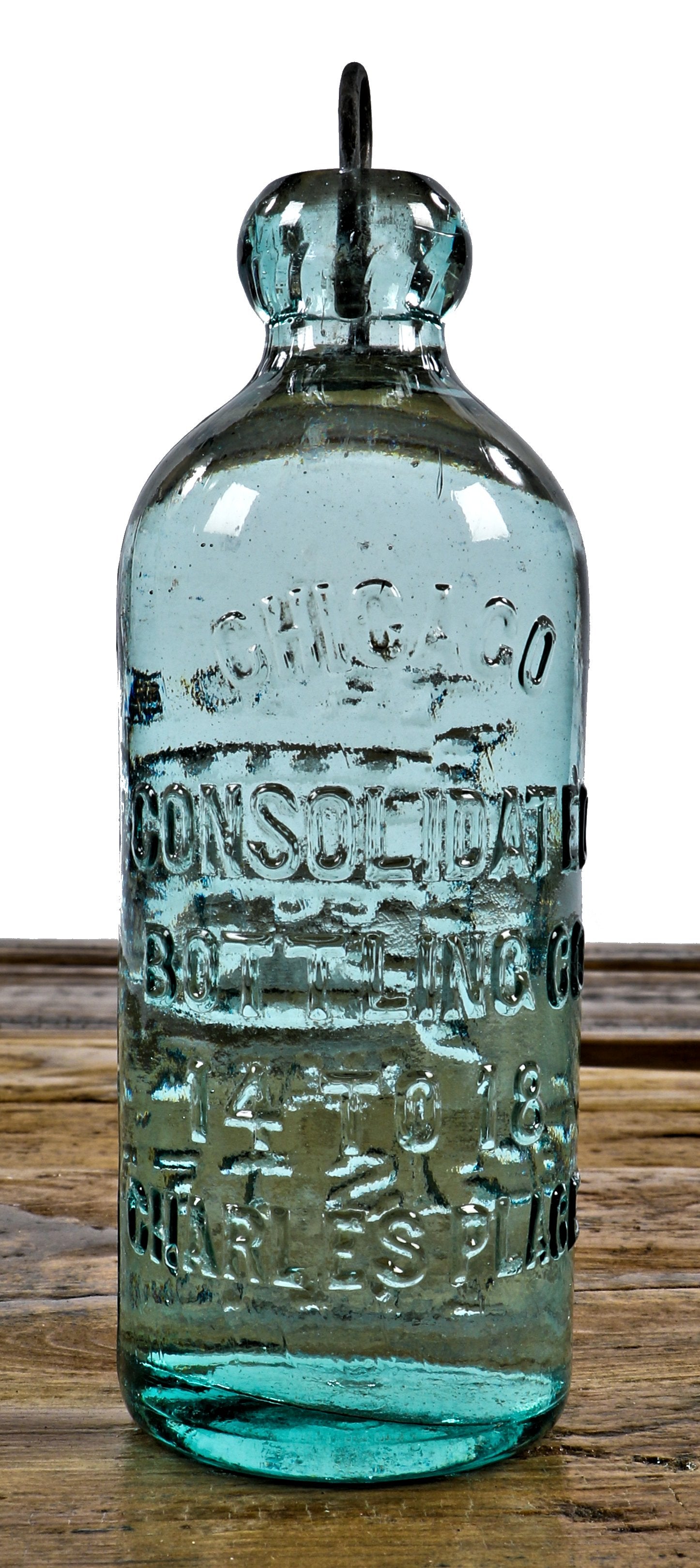 original and completely intact c. 1898 attic mint light aqua hutchinson style blobtop soda bottle manufactured for the consolidated bottling co., in chicago, il
