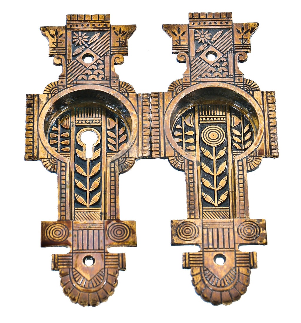 pair of original and intact ornamental cast bronze c. 1880's chicago three-flat interior residential pocket or sliding door backplates or escutcheons with nicely aged patina