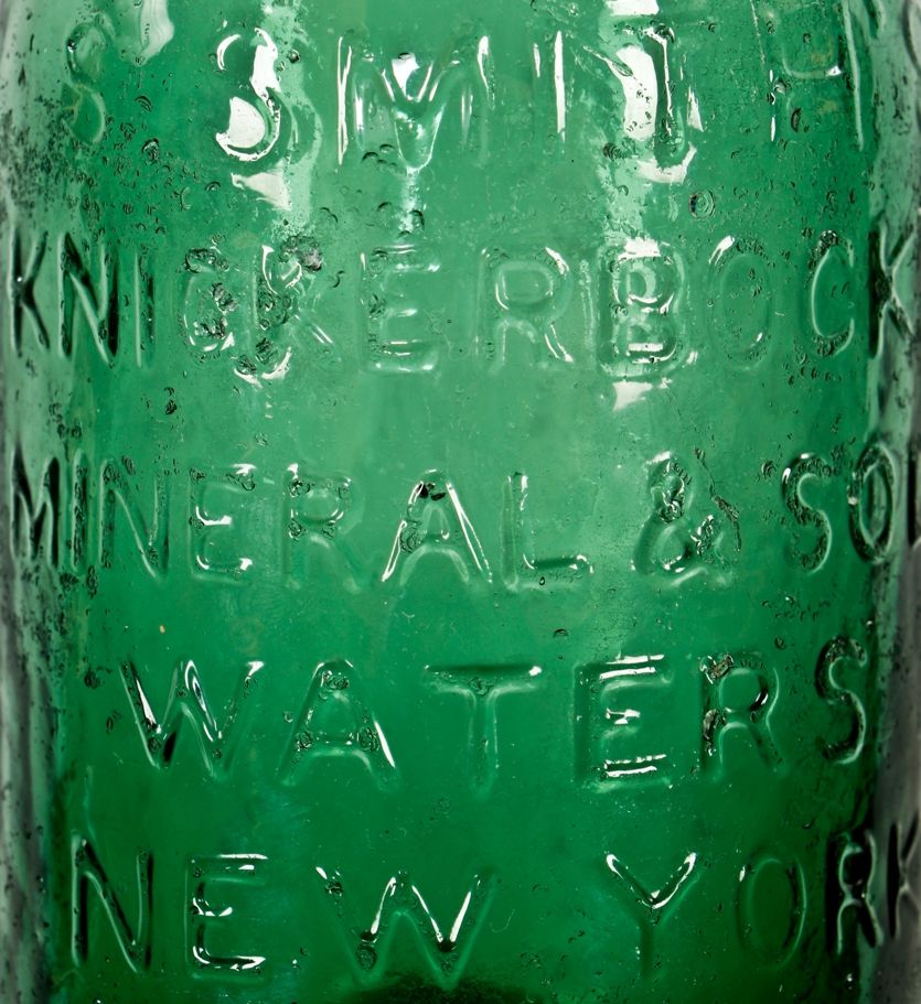 completely intact c. late 1840's light emerald green glass "knickerbocker" soda bottle manufactured for new york bottler samuel smith
