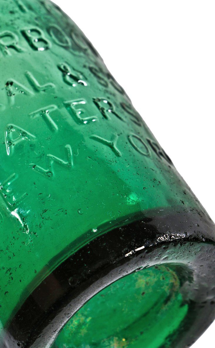 completely intact c. late 1840's light emerald green glass "knickerbocker" soda bottle manufactured for new york bottler samuel smith