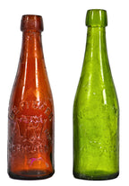 hard to find intact and original late nineteenth century reddish amber st. louis weiss style bottle manufactured for chicago bottler william pfeifer.
