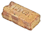 single original and documented 19th century stamped brick architectural artifact salvaged from the charles place lomax bottling works building site