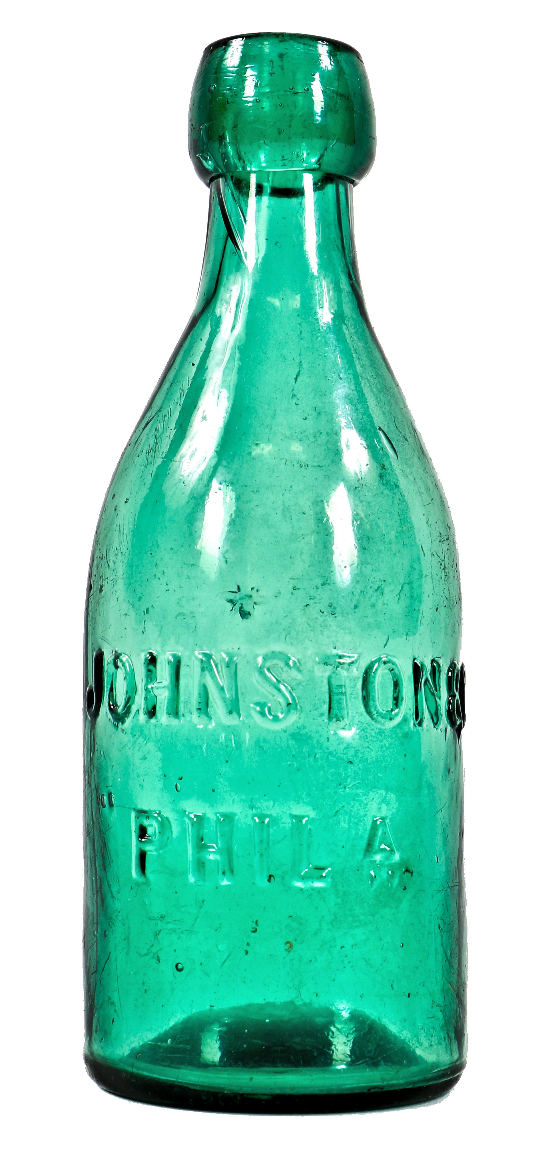 hard to find and near mint condition mid-nineteenth century vibrant green glass pony soda bottle fabricated for johnston & company, in philadelphia, pa.