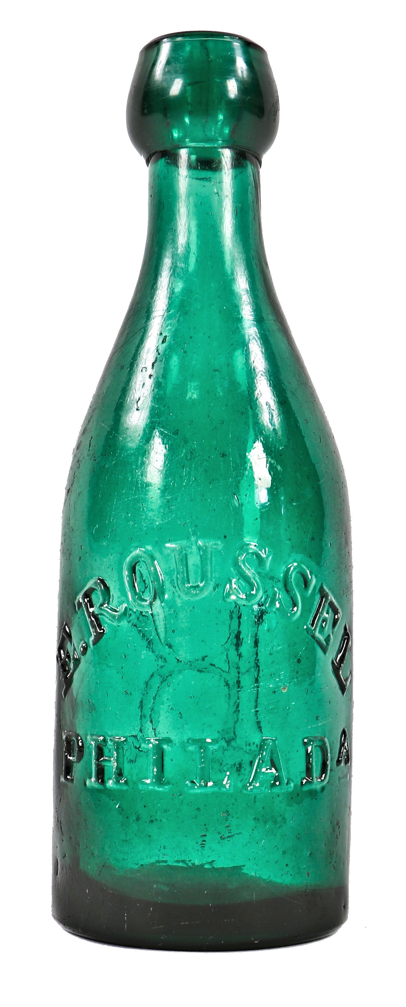 vibrantly colored original and intact c. 1860's civil war era emerald green glass applied blobtop soda bottle manufactured for philadelphia bottler eugene roussel