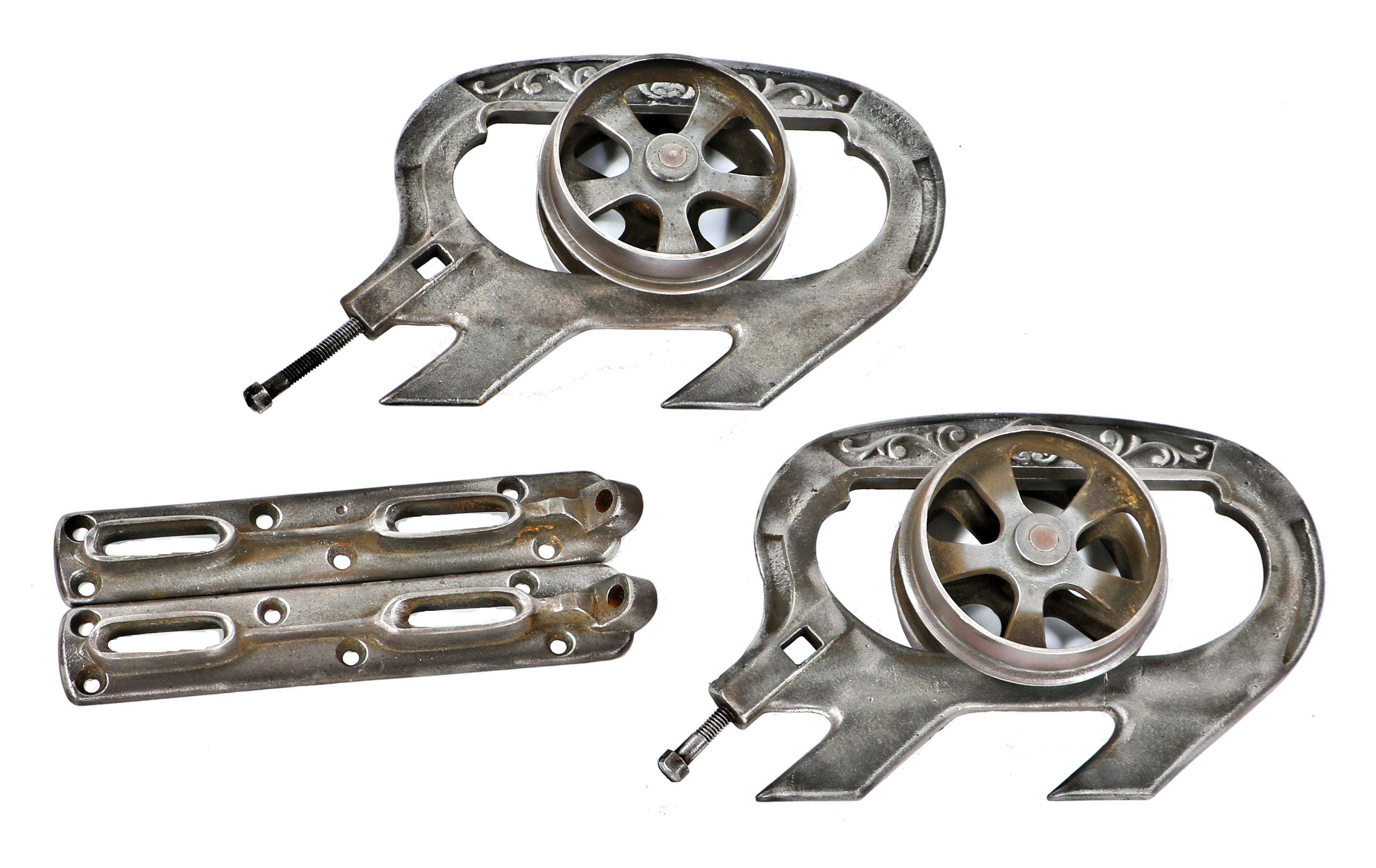 matching intact and refinished late 19th century hard to find original interior residential ornamental cast iron single pocket door brackets or hangers with rollers and base plates