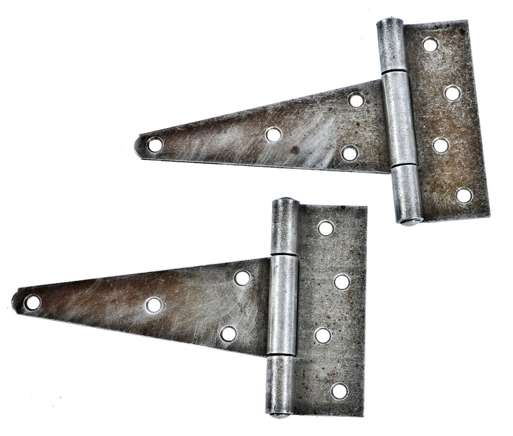 matching set of late 19th or early 20th century american antique industrial wrought steel loose pin strap hinges salvages from the doors of a chicago brewhouse undergoing demolition