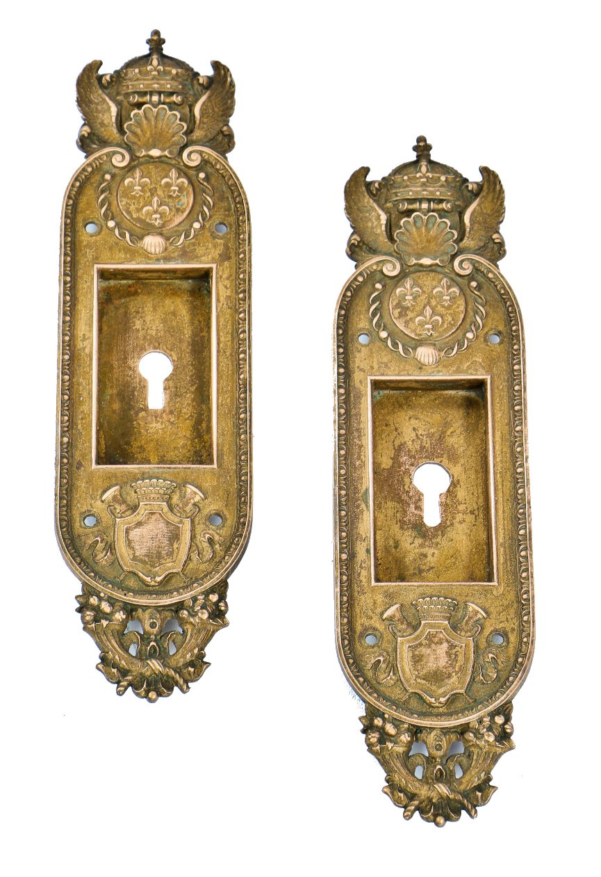 matching set of oversized and heavily ornamented antique american cast brass interior residential pocket door escutcheons or backplates with unusual design elements