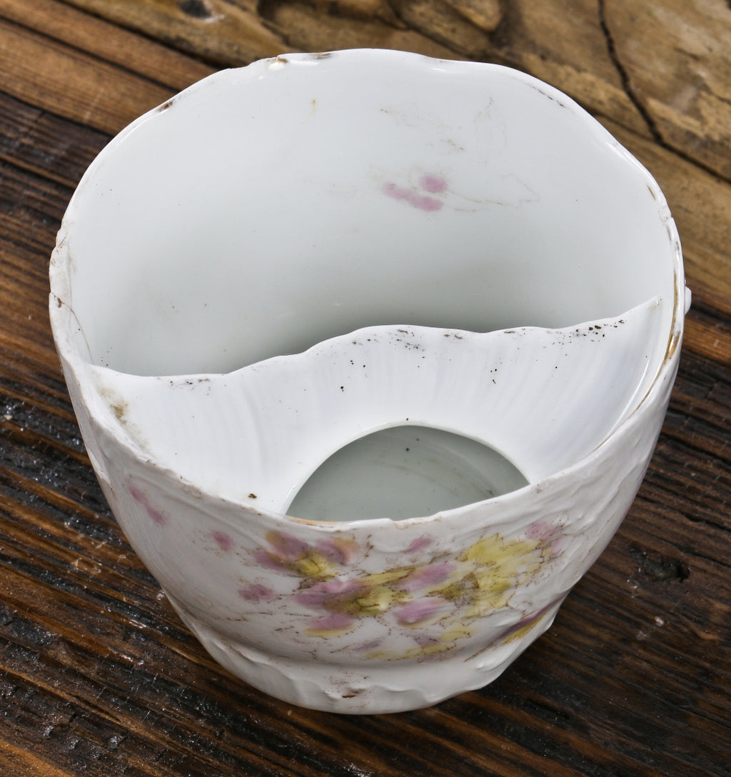 original and unusual antique c. late nineteenth century floral ceramic mustache cup dug from a chicago area privy pit.