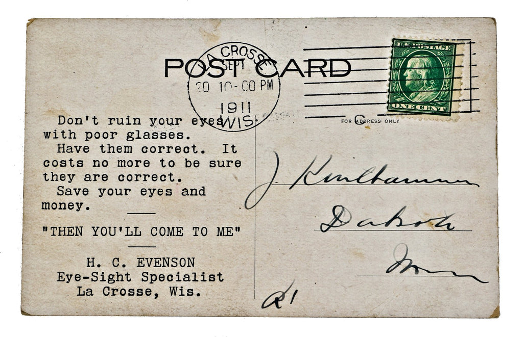 original and intact early twentieth century advertising postcard promoting h.c. evenson's optometry practice and storefront in la crosse, wisconsin