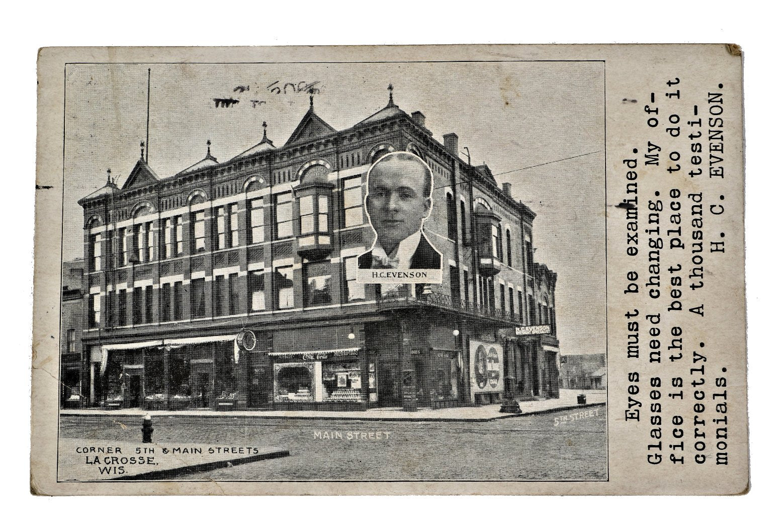 original and intact early twentieth century advertising postcard promoting h.c. evenson's optometry practice and storefront in la crosse, wisconsin