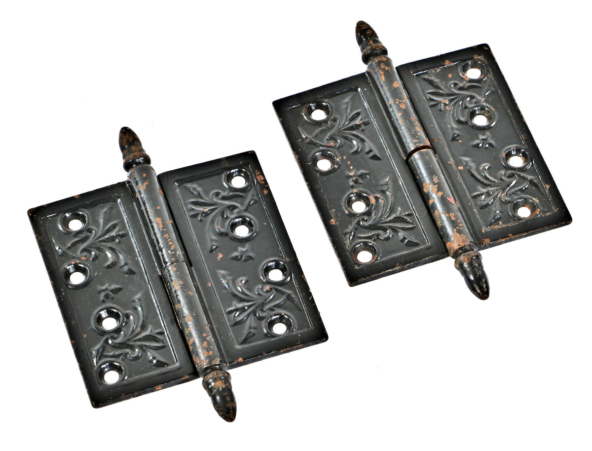 matching set of 19th century ornamental original baked-on black enameled cast iron oversized loose pin interior residential hinges with pronounced acorn finials