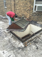 rare and hard to find completely intact c. 1909 exterior residential compact double-pitched metal wire glass rooftop skylight with nicely aged copper flashings and ventilator