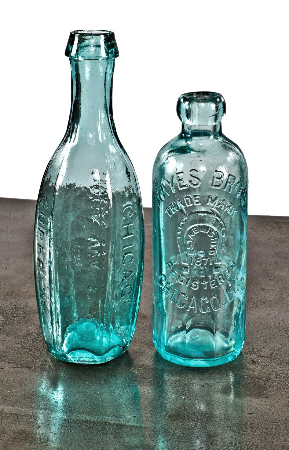 remarkably rare and seldom found original mid-1840's light aqua blue "superior" six-sided tenpin chicago soda or mineral water glass bottle with crude short tapered top
