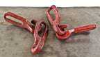 group of four nicely distressed oversized late 19th or early 20th century hand-forged wrought iron red painted interlocking hooks from a factory or farmstead
