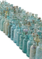 enormous lot of all original late nineteenth century aqua blue and green hutchinson style blobtop soda and mineral water bottles manufactured for various bottlers and dug in chicago