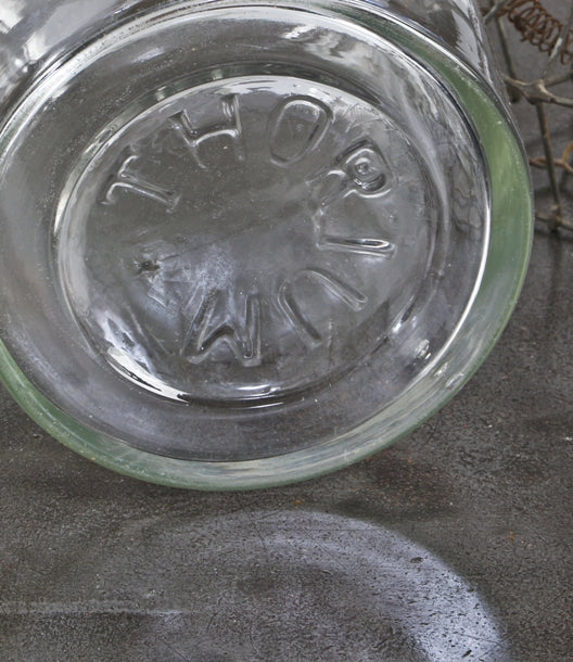all original and seldom found oversized early 20th century antique american industrial well-maintained and cleaned clear glass "thorium" laboratory bottle with original ground glass stopper