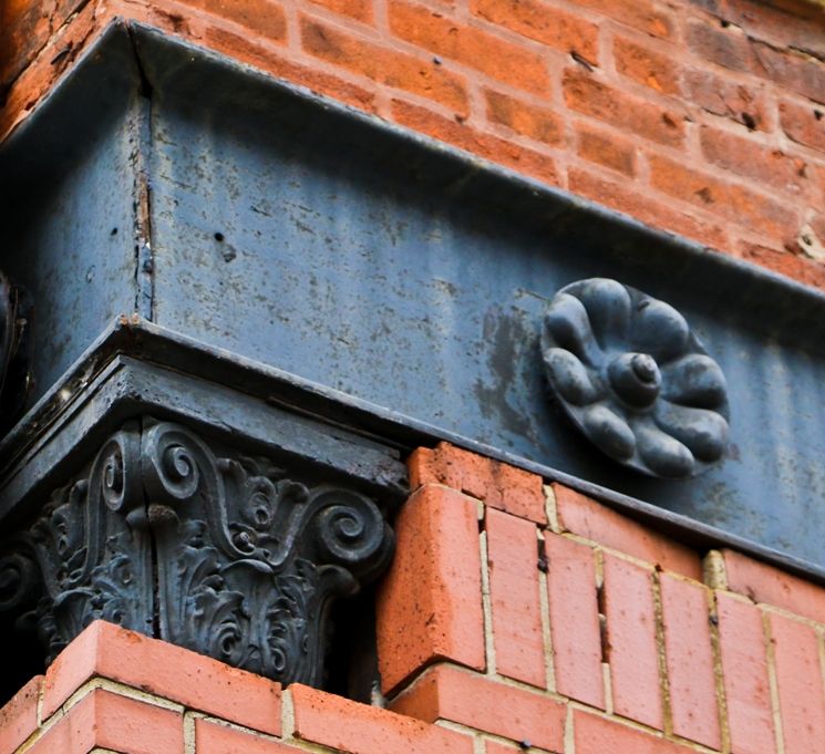 original 1879-1883 american ornamental exterior cast iron corner column capital ionic style panel salvaged from the historically important john voltz hall building
