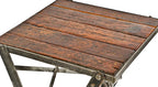 thoroughly cleaned and refinished antique american industrial repurposed collapsible riveted joint angled steel work stand with newly added pine wood top