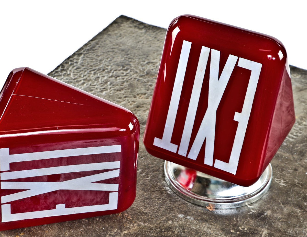 one of two matching c. 1930's american art deco style depression era ruby red glass double-sided ceiling-mount illuminated exit light fixtures with chrome shade fitter