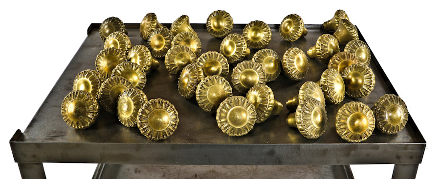 several matching early 1920's antique american neoclassical cast brass doorknobs salvaged from the javis hunt-designed chicago tribune printing plant or building