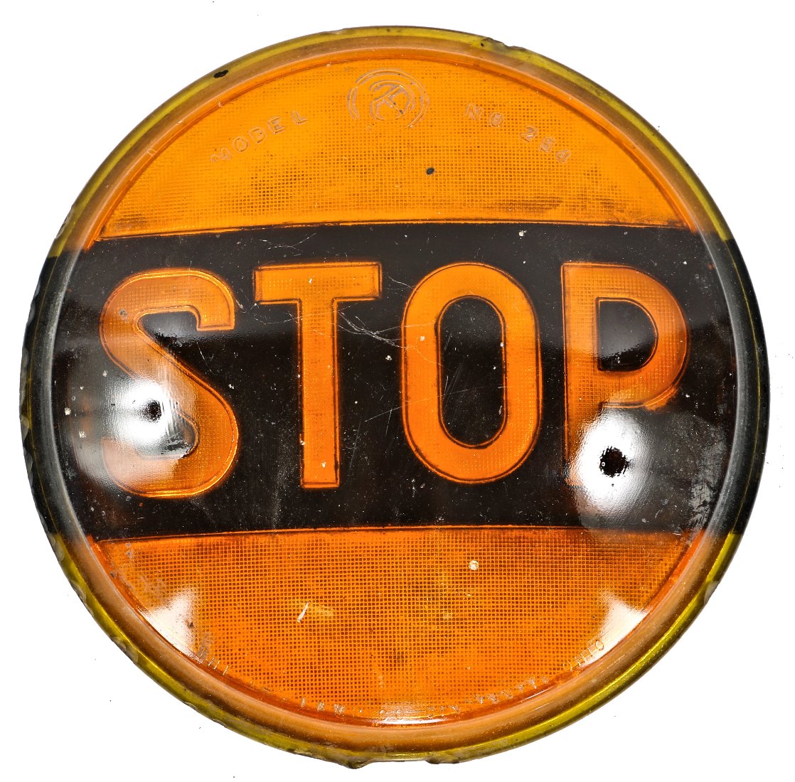 original c. 1930's or 1940's american vintage industrial pressed black enameled orange glass "stop" light lens used as an accessory for trucks and trailers