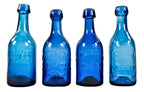 highly collectible antique american mid-nineteenth century deep cobalt blue glass iron pontiled soda bottle with appealing crudity fabricated for chicago bottling giant william h. hutchinson & company.
