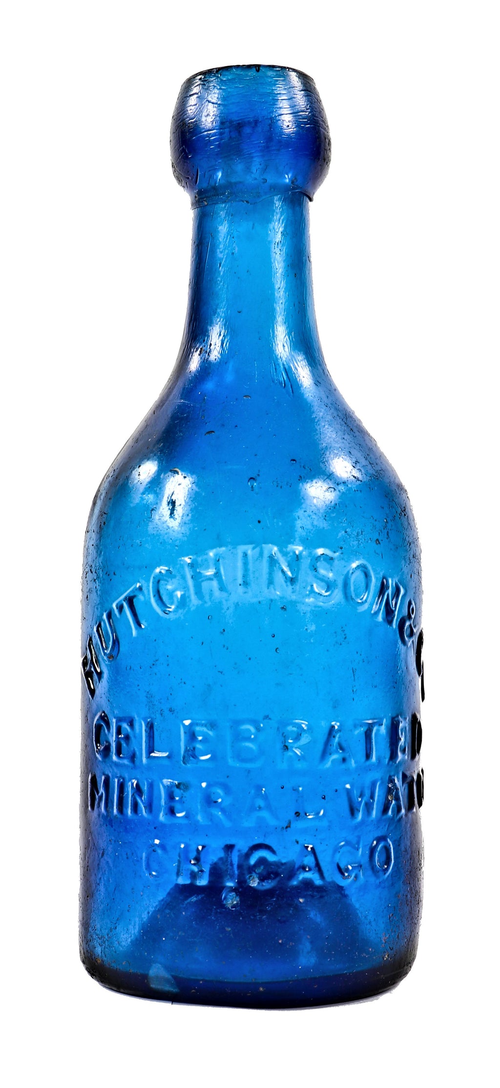 highly collectible antique american mid-nineteenth century deep cobalt blue glass iron pontiled soda bottle with appealing crudity fabricated for chicago bottling giant william h. hutchinson & company.