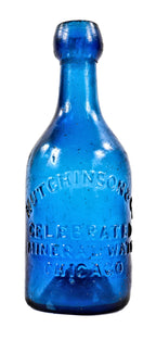 highly collectible antique american mid-nineteenth century deep cobalt blue glass iron pontiled soda bottle with appealing crudity fabricated for chicago bottling giant william h. hutchinson & company.