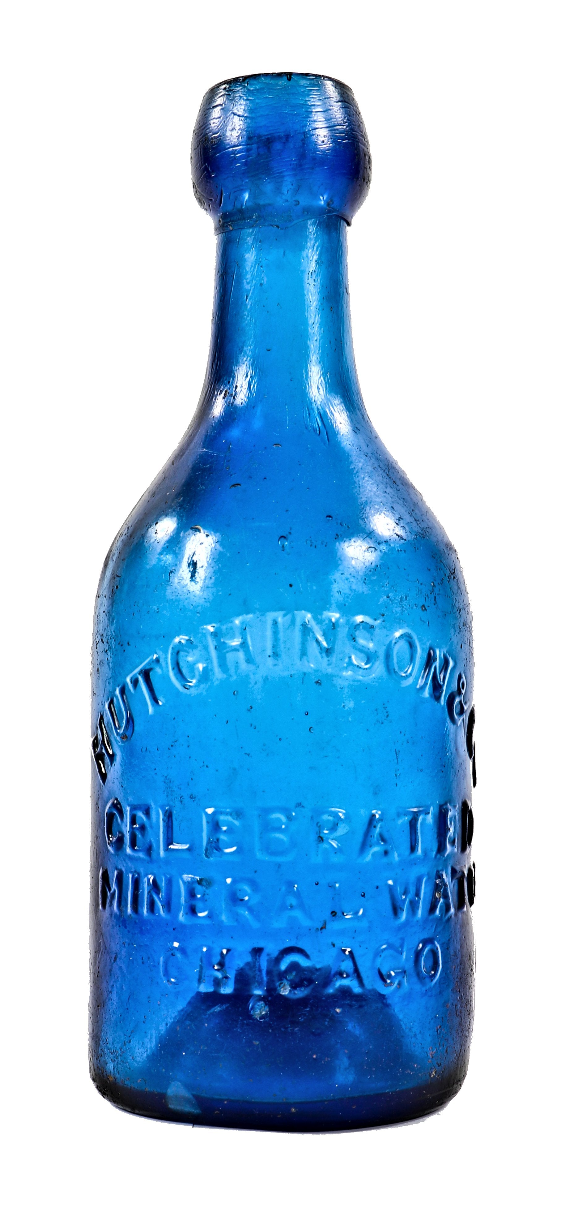 highly collectible antique american mid-nineteenth century deep cobalt blue glass iron pontiled soda bottle with appealing crudity fabricated for chicago bottling giant william h. hutchinson & company.
