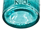 single hard to find and all original crude mid-nineteenth century vibrant greenish aqua pontiled soda bottle manufactured for new orleans bottler miguel piris.