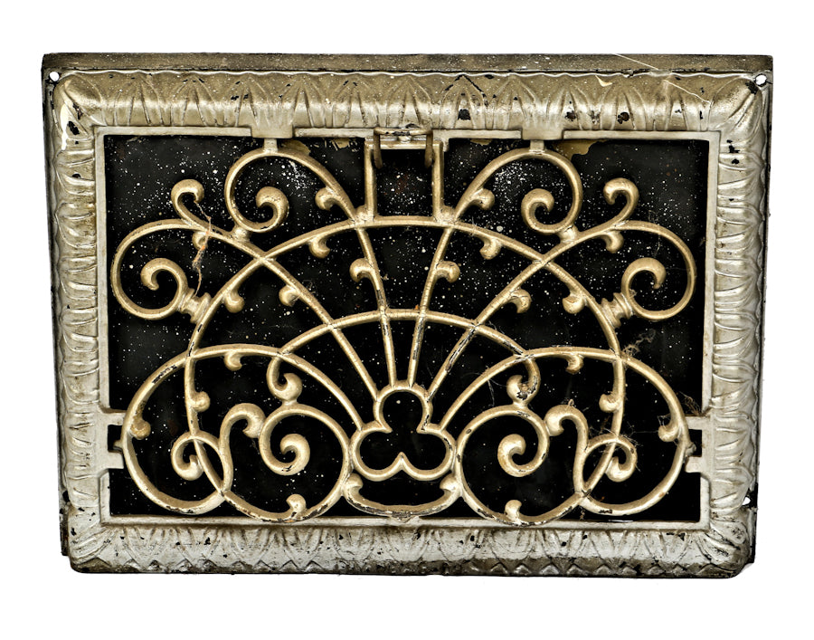 all original and fully functional antique american early 20th century ornamental cast iron single-louvered heat register or grate with metallic silver finish