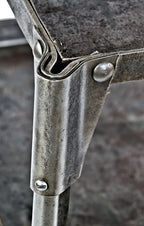 early 1930's antique american industrial freestanding pressed and formed steel stationary "uhl art steel" tool stand with riveted joint reinforced corner guards