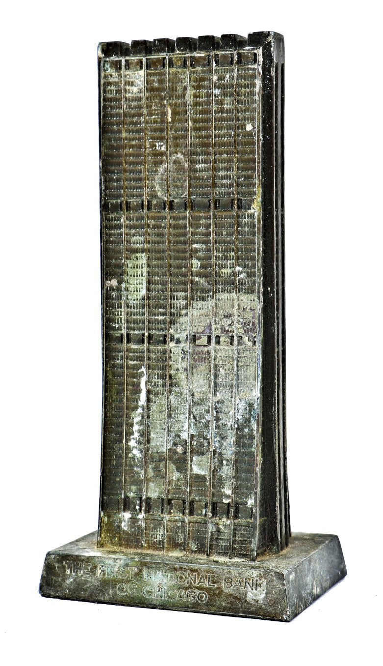 hard to find and all original dug downtown chicago collectible early 1970's cast spelter or "white metal" banthrico coin bank representing the first national bank of chicago, il.