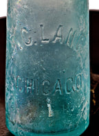 original and completely intact antique 1878-1880's privy dug blue aqua glass hutchinson style soda bottle fabricated for f.c. lang in chicago, il