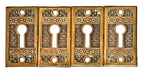 a group of original 1880's antique american ornamental cast brass interior residential "brocade" pattern oversized keyhole escutcheons