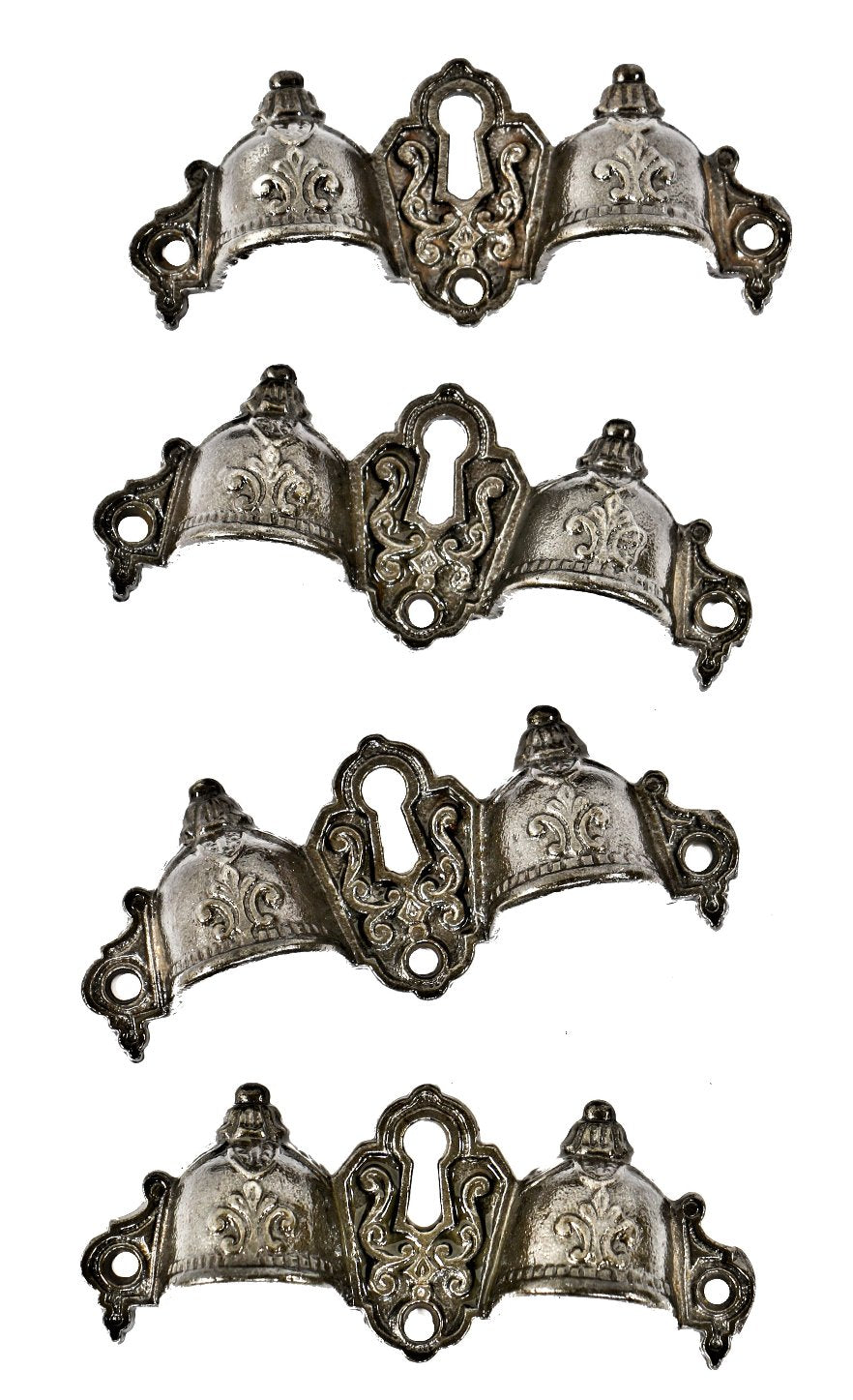 four matching original and completely intact refinished ornamental cast iron druggists' cabinet drawer pulls with centrally located keyholes