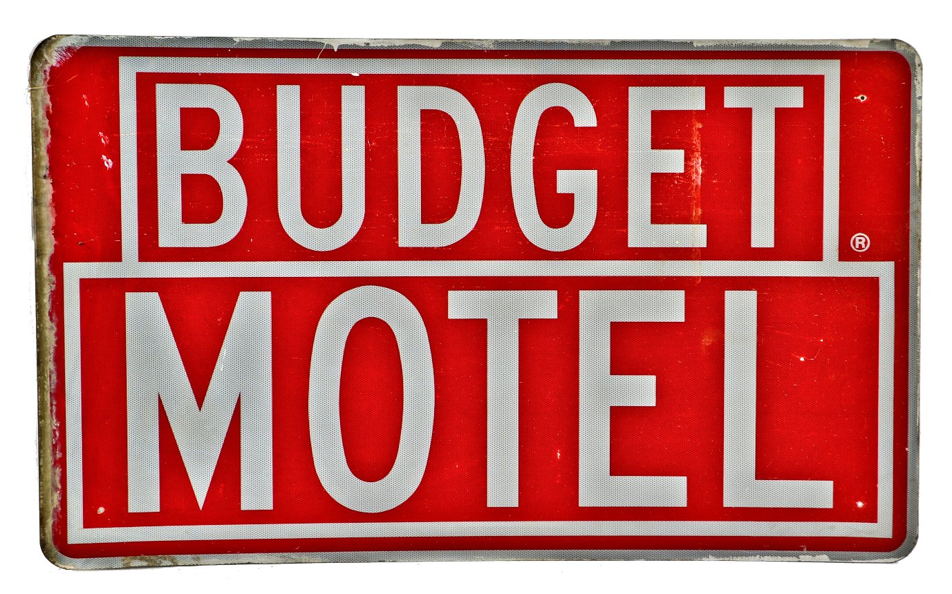 original american vintage roadside oversized single-sided exterior "budget motel" stamped aluminum sign with a brightly colored reflective surface