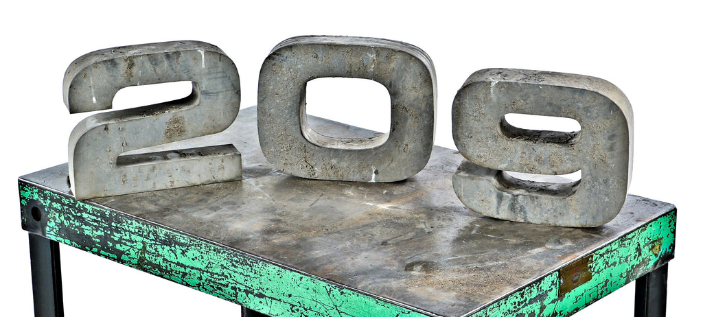 exterior pressed and folded vintage american industrial "209" address number sign salvaged from the facade of the osborne and adams building during its demolition