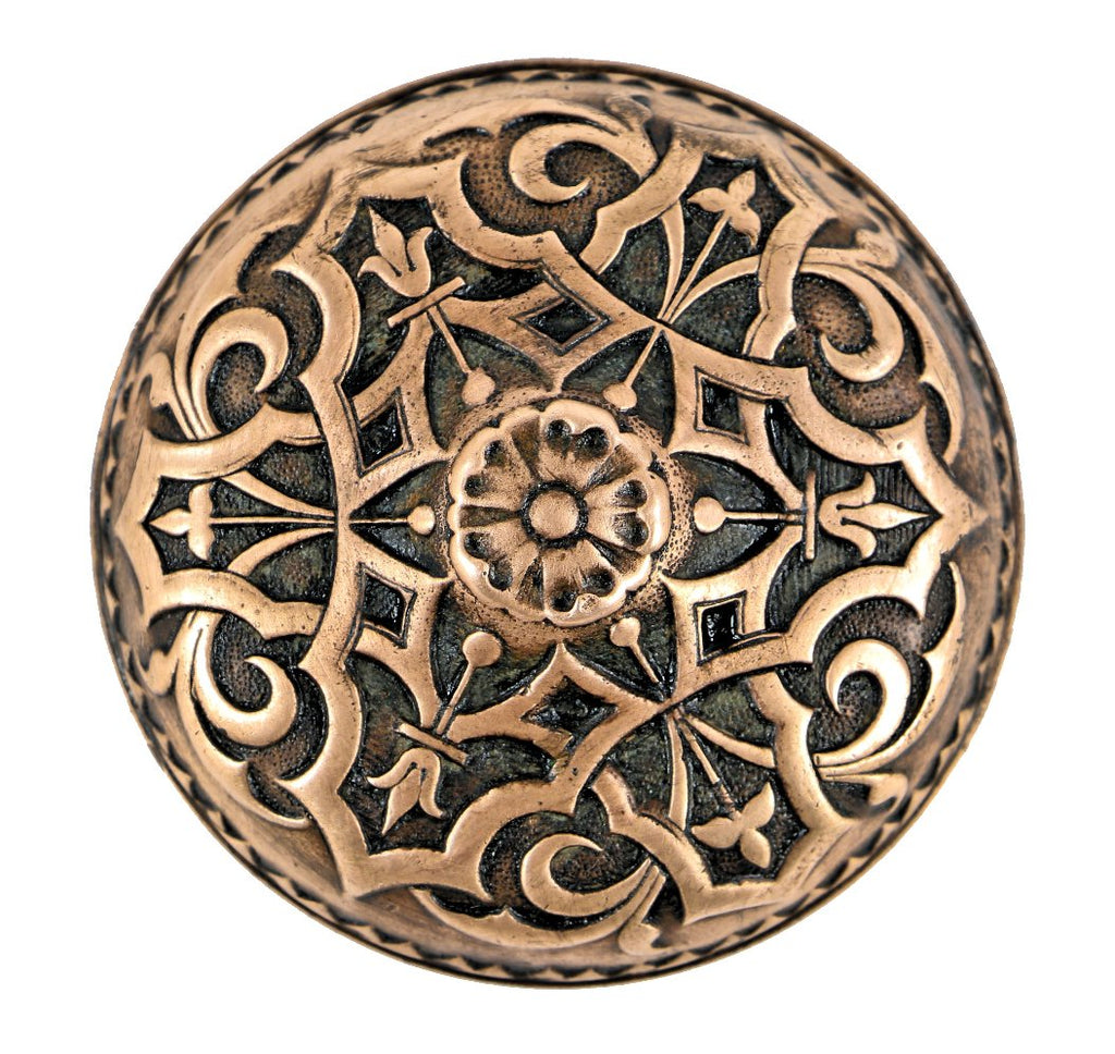 single entrance size ornamental cast bronze c. 1870's intricately designed residential entrance door handle with a banded edge and raised center