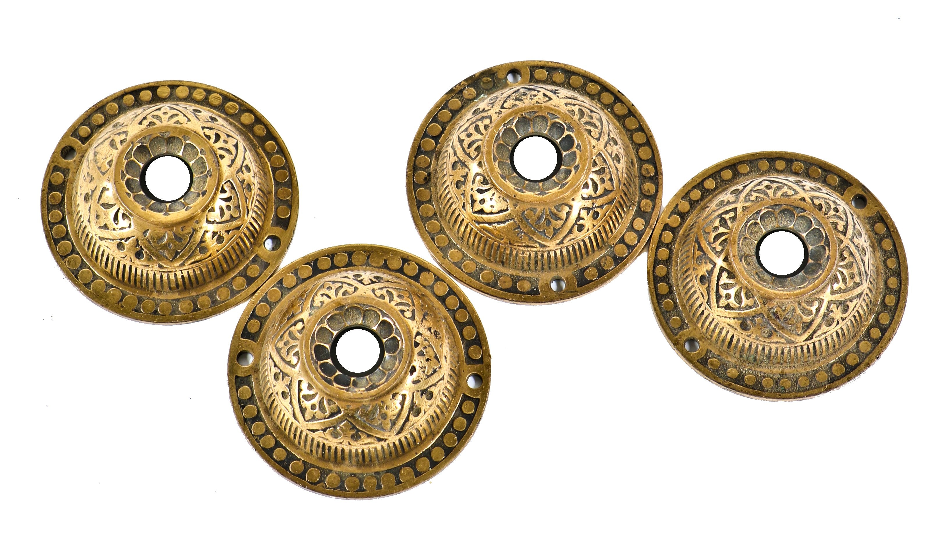 one of four matching c. 1880's ornamental cast bronze exterior residential circular-shaped push button doorbell covers or backplates with nicely aged patina